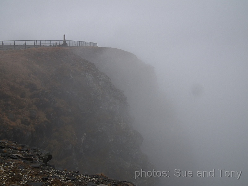 day 8 breakfast at nordkap 0011.jpg - looking from the Globe acorss the cape.  Shrouded in fog